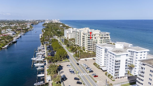 birds eye view of property featuring a water view