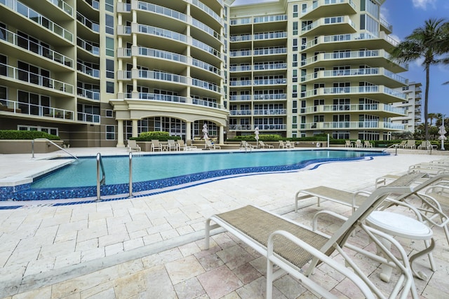 view of pool featuring a patio