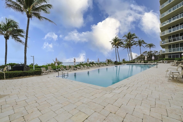 view of pool featuring a patio