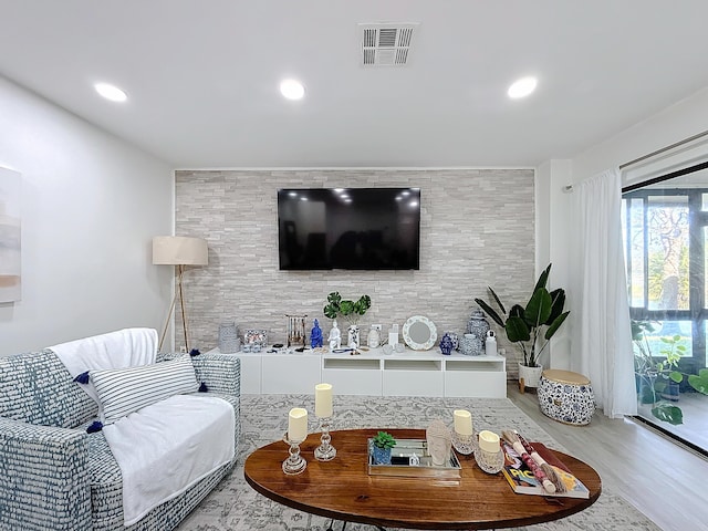 living room with wood-type flooring