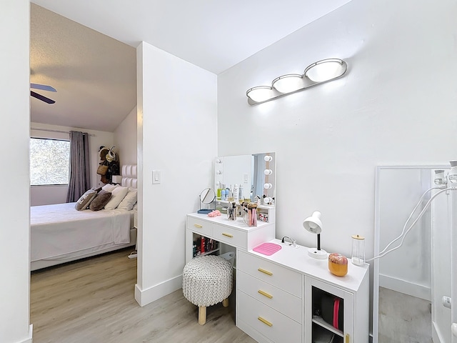 bathroom featuring ceiling fan and hardwood / wood-style floors