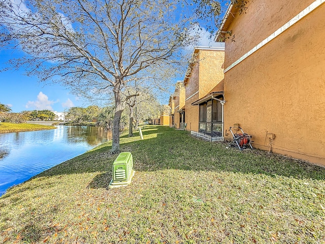 view of yard featuring a water view