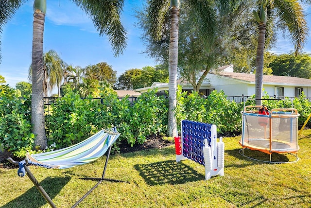 view of yard with a trampoline