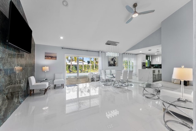 living area featuring ceiling fan, marble finish floor, high vaulted ceiling, and recessed lighting