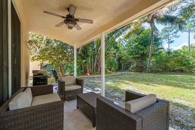 view of patio with a grill, an outdoor hangout area, and ceiling fan