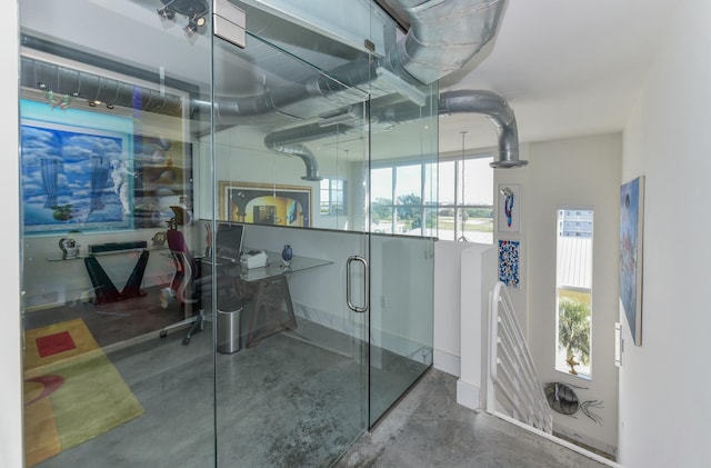 bathroom featuring concrete flooring