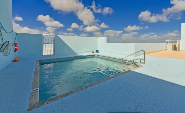 view of pool with a patio area