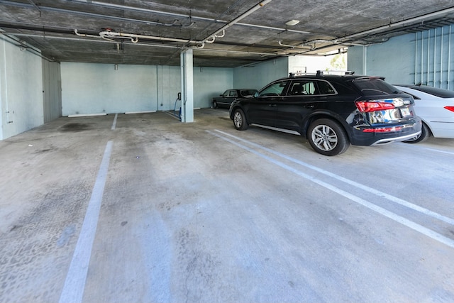 garage featuring a carport