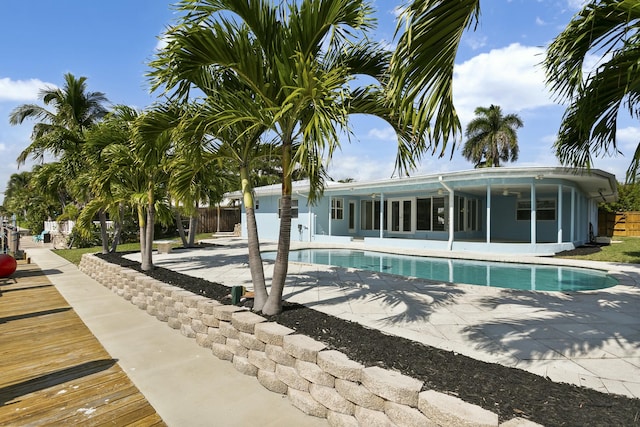 view of pool featuring a patio area