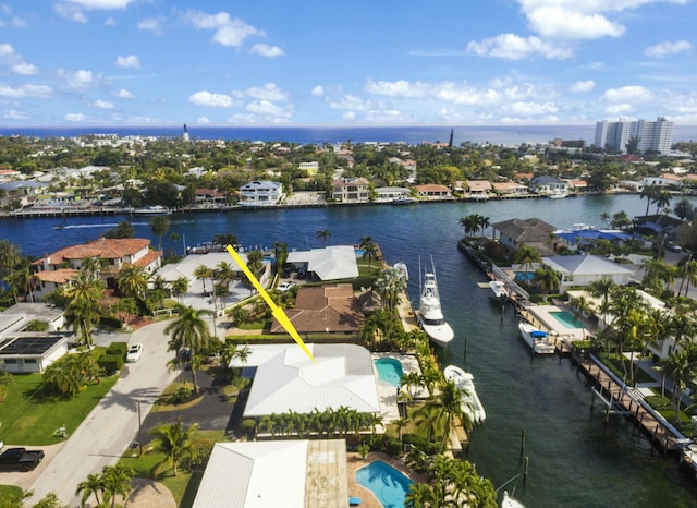 drone / aerial view with a water view