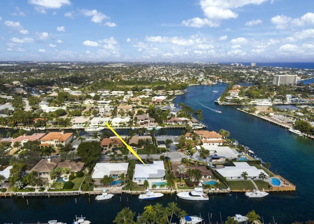 birds eye view of property featuring a water view