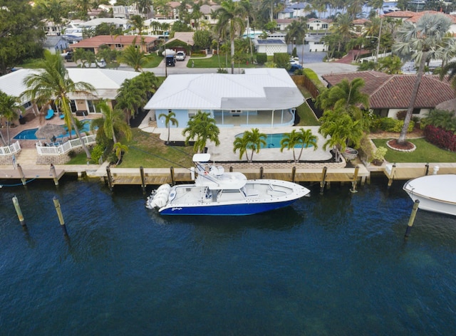 bird's eye view with a water view