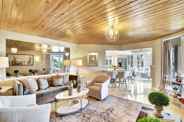 living room featuring wood ceiling, light tile patterned floors, and a notable chandelier