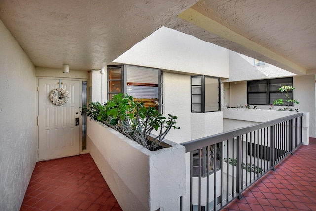 property entrance with a balcony