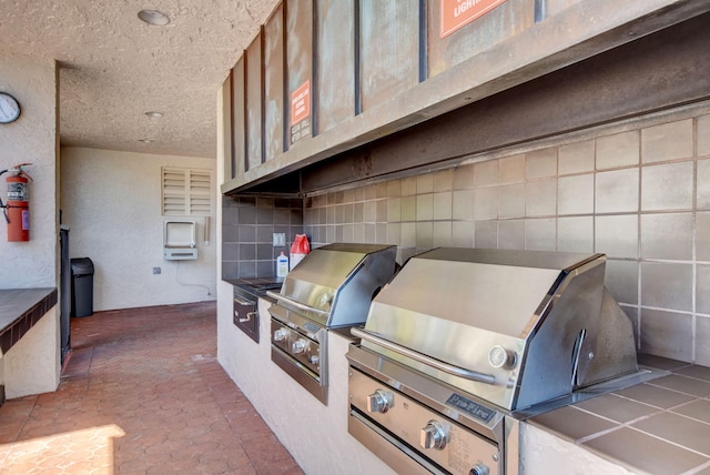 view of patio with area for grilling