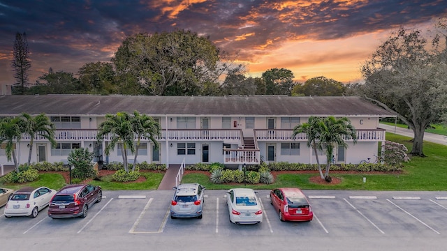 view of outdoor building at dusk