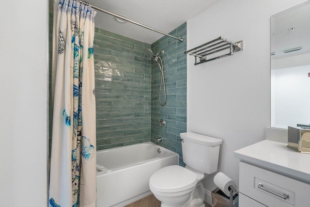 full bathroom featuring shower / bath combination with curtain, vanity, and toilet