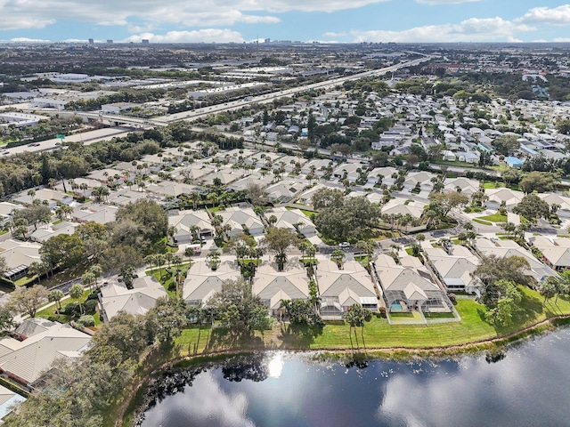aerial view with a water view and a residential view