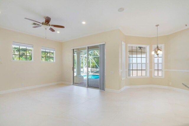 living room with a notable chandelier and a healthy amount of sunlight