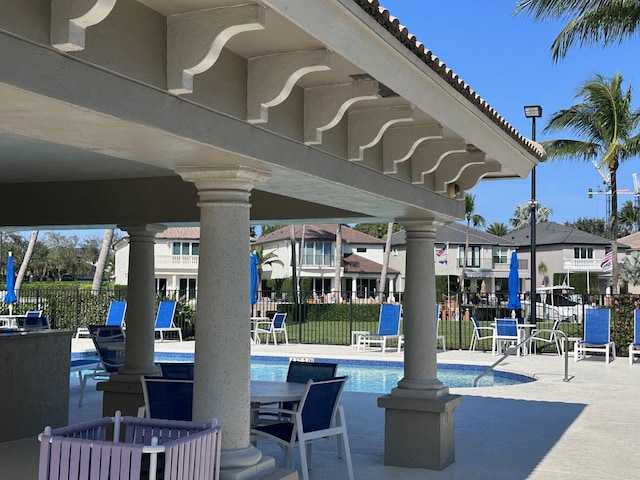 view of patio with a community pool