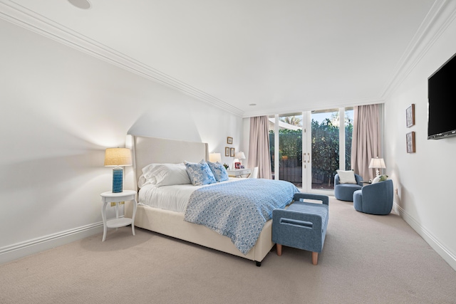 bedroom with baseboards, access to outside, carpet floors, and crown molding
