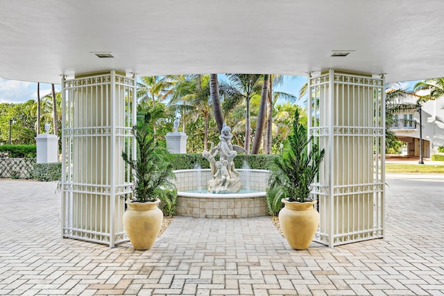 view of patio featuring a gate