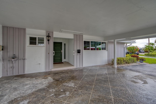 property entrance with a patio