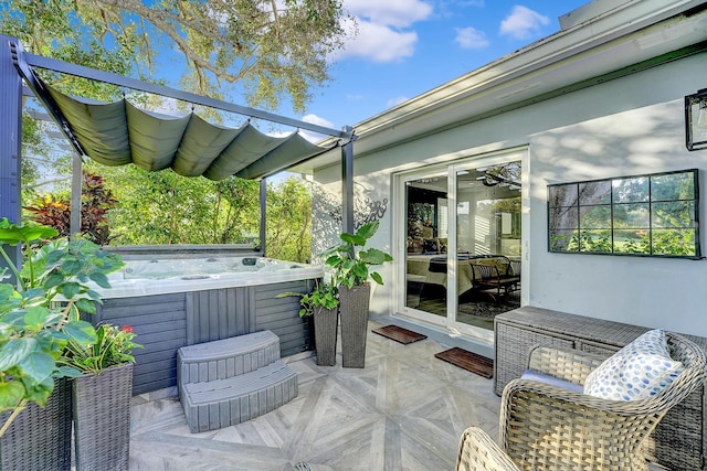 view of patio featuring a hot tub