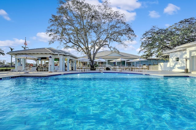 view of pool featuring a gazebo and a patio area