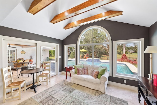 interior space with vaulted ceiling with beams