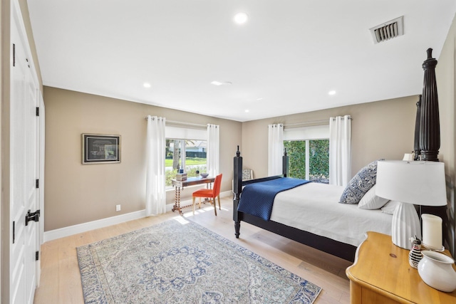 bedroom featuring light wood-type flooring