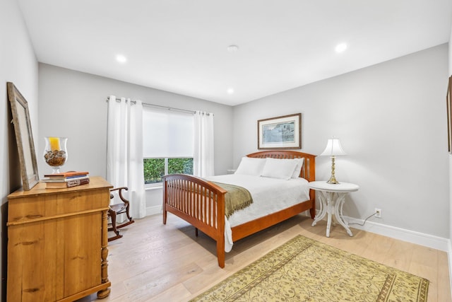 bedroom featuring hardwood / wood-style floors