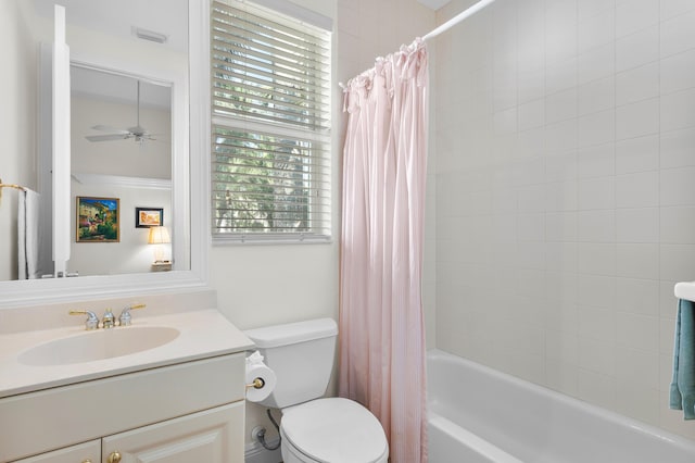 full bathroom featuring vanity, ceiling fan, toilet, and shower / bath combo