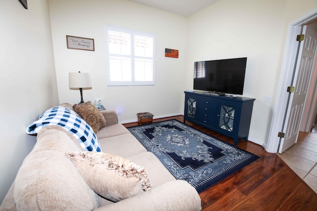 living room featuring dark hardwood / wood-style flooring