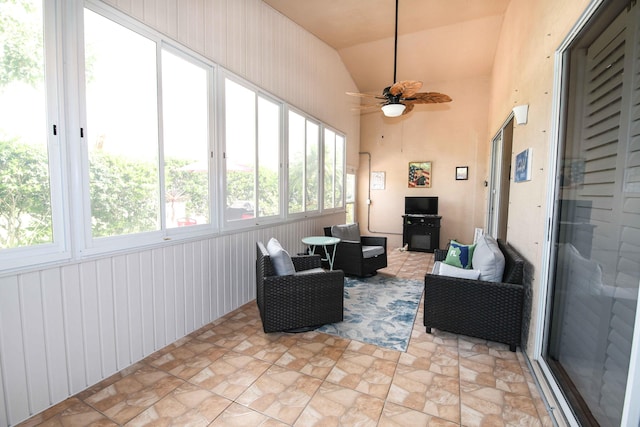 sunroom with vaulted ceiling and ceiling fan