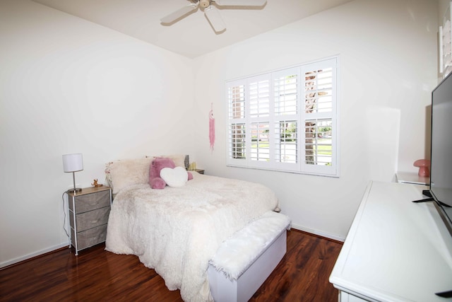 bedroom featuring ceiling fan and dark hardwood / wood-style flooring