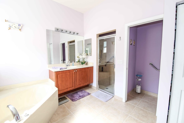 bathroom with vanity, tile patterned floors, and separate shower and tub