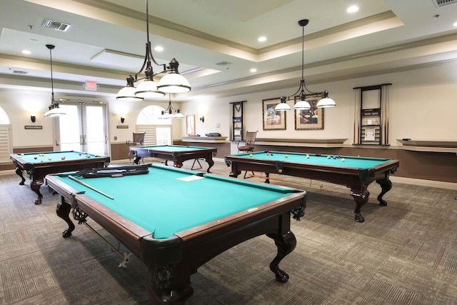 game room featuring a tray ceiling, billiards, french doors, and carpet flooring