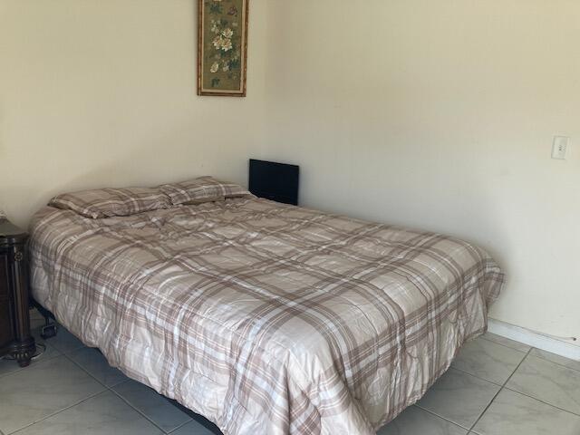 view of tiled bedroom