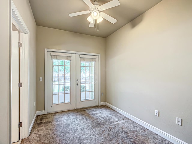 entryway with carpet flooring, ceiling fan, and french doors