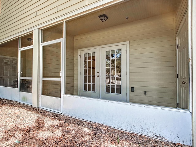 property entrance featuring french doors