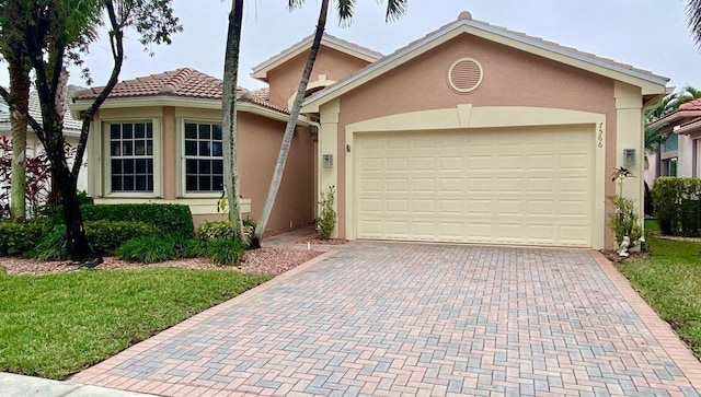 view of front of house with a garage