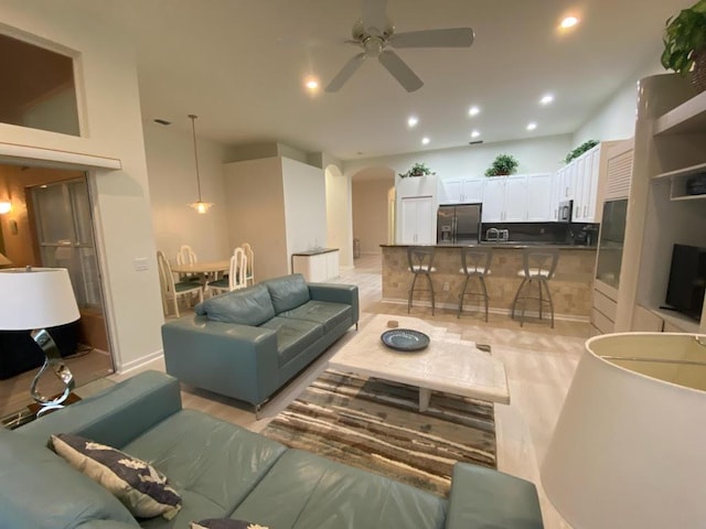 living room featuring ceiling fan