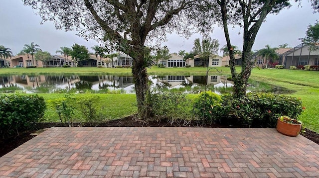 view of patio featuring a water view