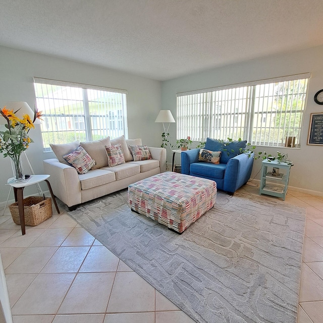 tiled living room with a textured ceiling