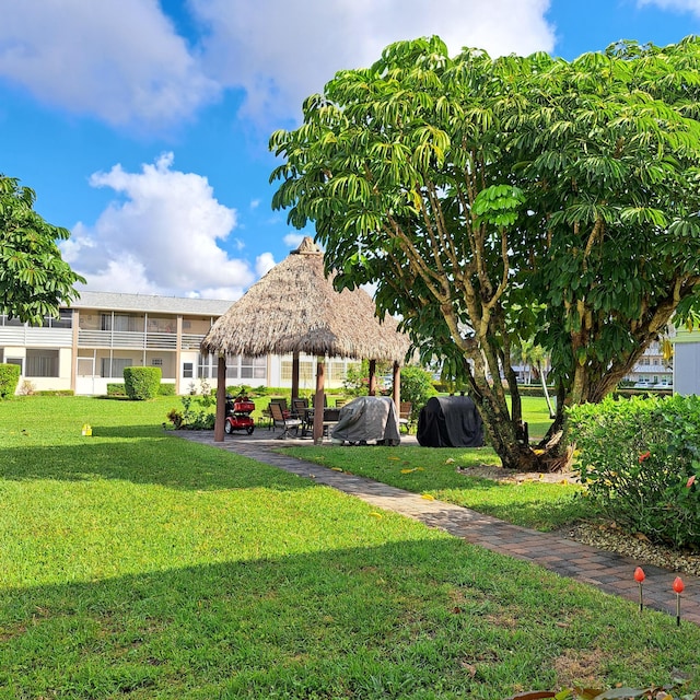 surrounding community featuring a yard and a gazebo