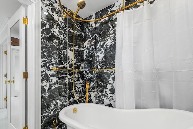 bathroom with tile walls