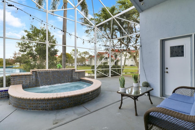 view of patio / terrace featuring pool water feature, an outdoor hot tub, and glass enclosure