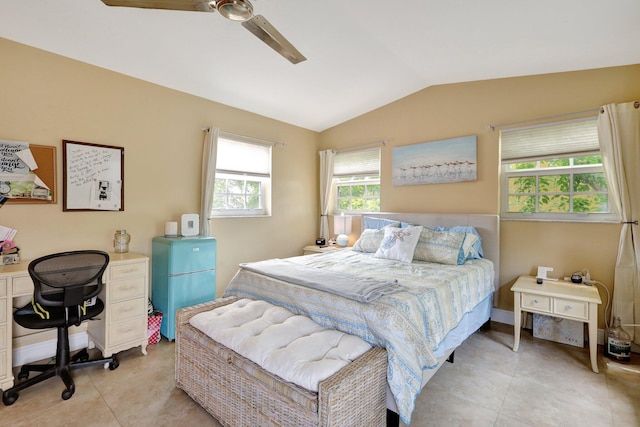 tiled bedroom featuring vaulted ceiling, fridge, and ceiling fan