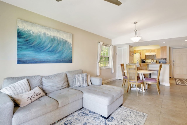 living room with light tile patterned flooring and lofted ceiling